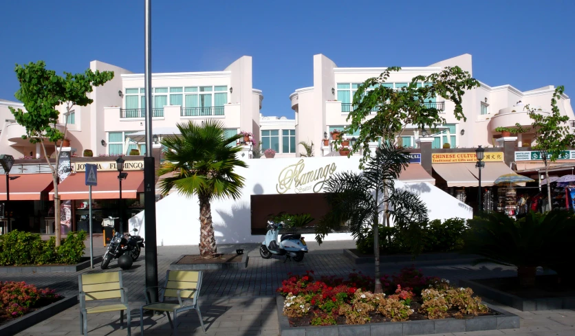 some buildings are seen in the daytime on a sunny day