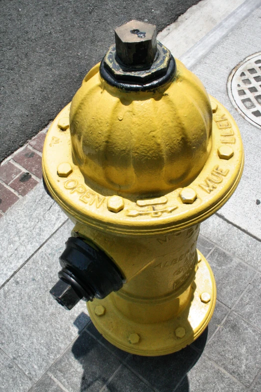 a fire hydrant that has been painted yellow