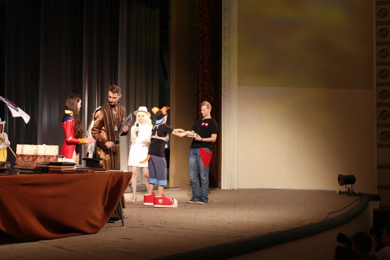 some children are playing on a stage set