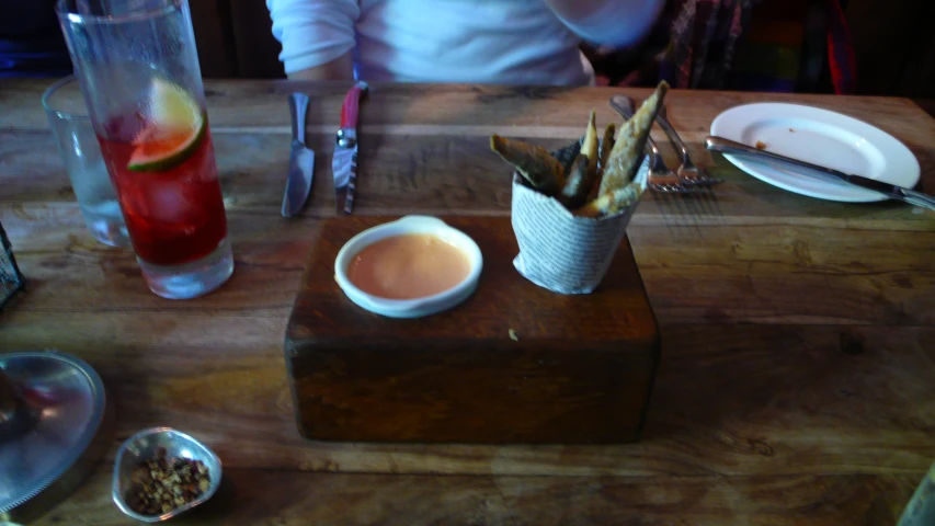 some fries and drinks on a table