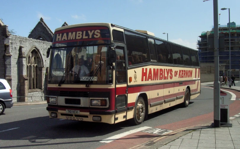 a city bus that is traveling down the street