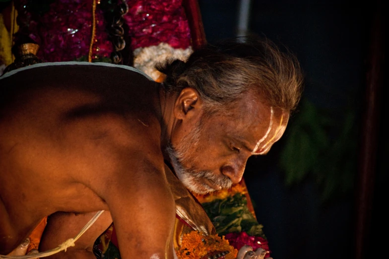 a man that is wearing some kind of jewelry