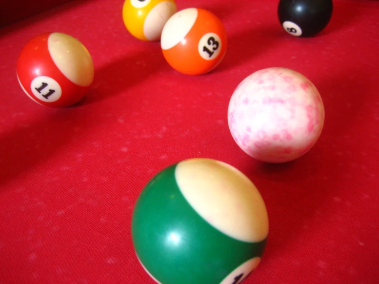 balls are placed in a pool of different colors