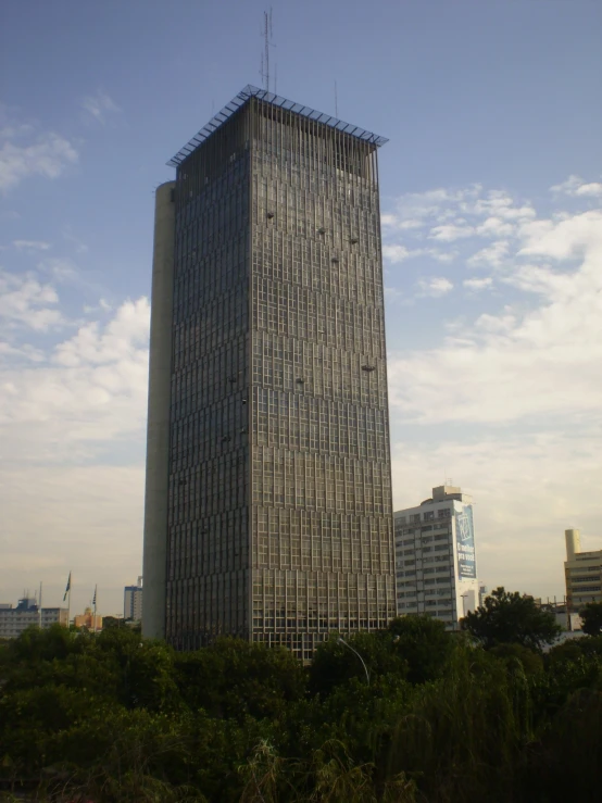 a building with some scaffolding on top of it in a city