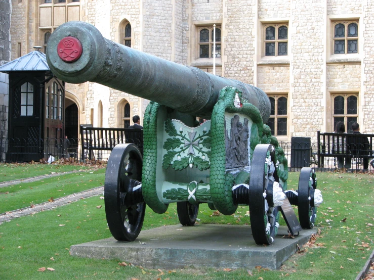 the cannon is on display in front of the castle