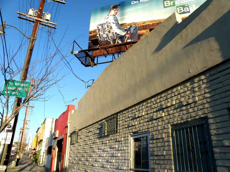 a billboard is on the side of the building