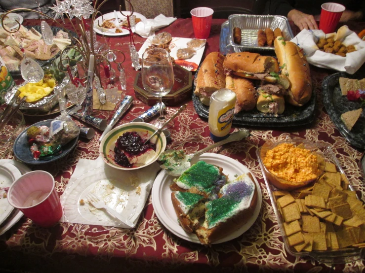 a table filled with lots of food and condiments