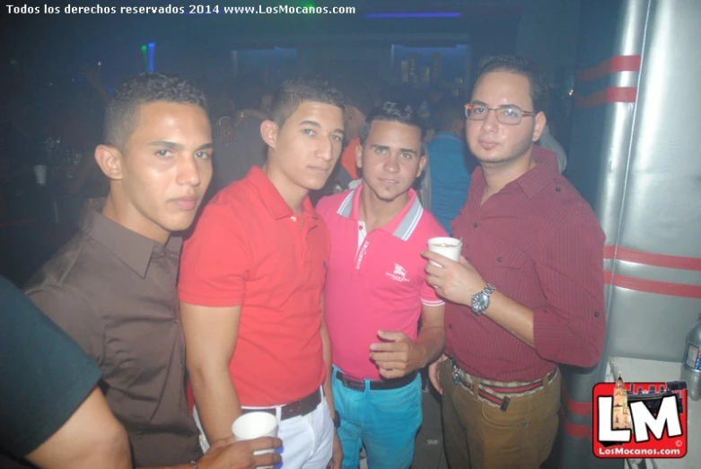 a group of men pose for a picture at the club