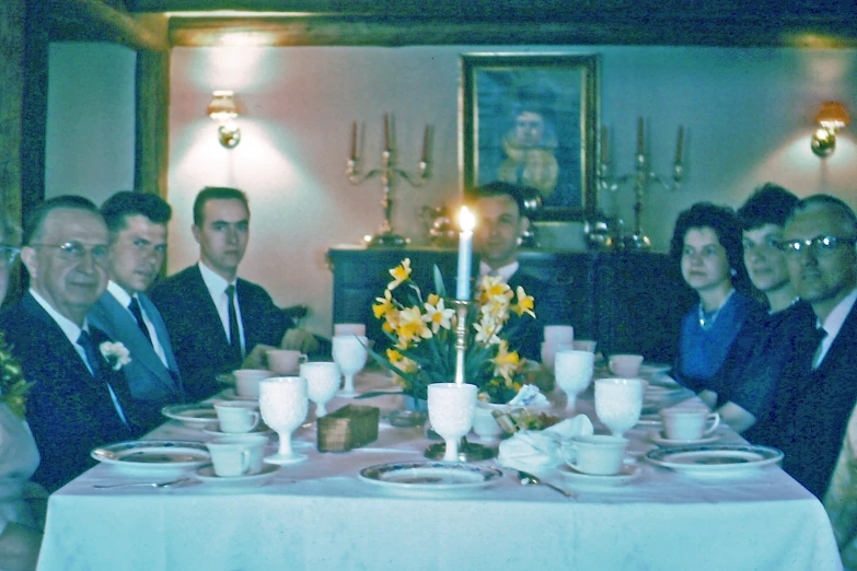 a family at the dinner table enjoying each others company