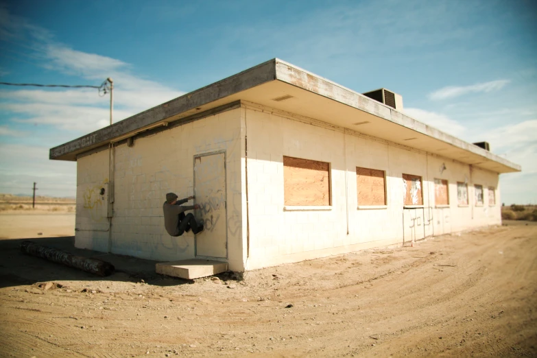 this is an old building with some rusted out doors