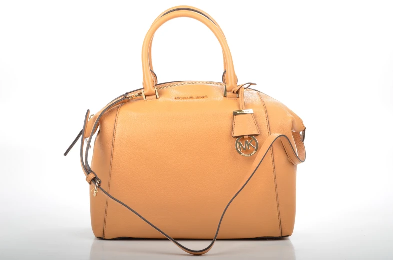 a brown handbag on top of a white background