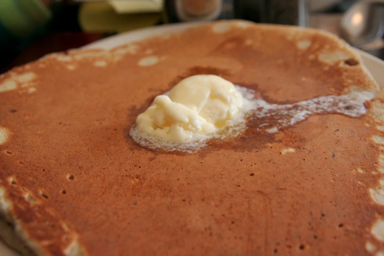 a white plate with some kind of food that is on it