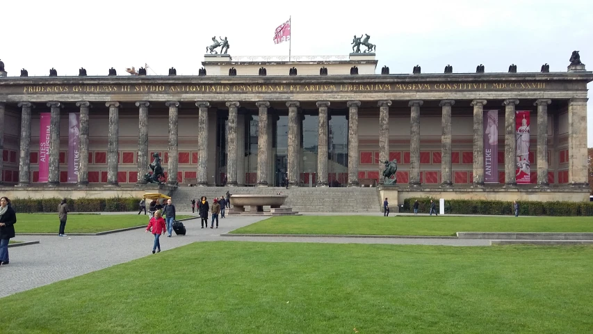 a large building with two floors and columns