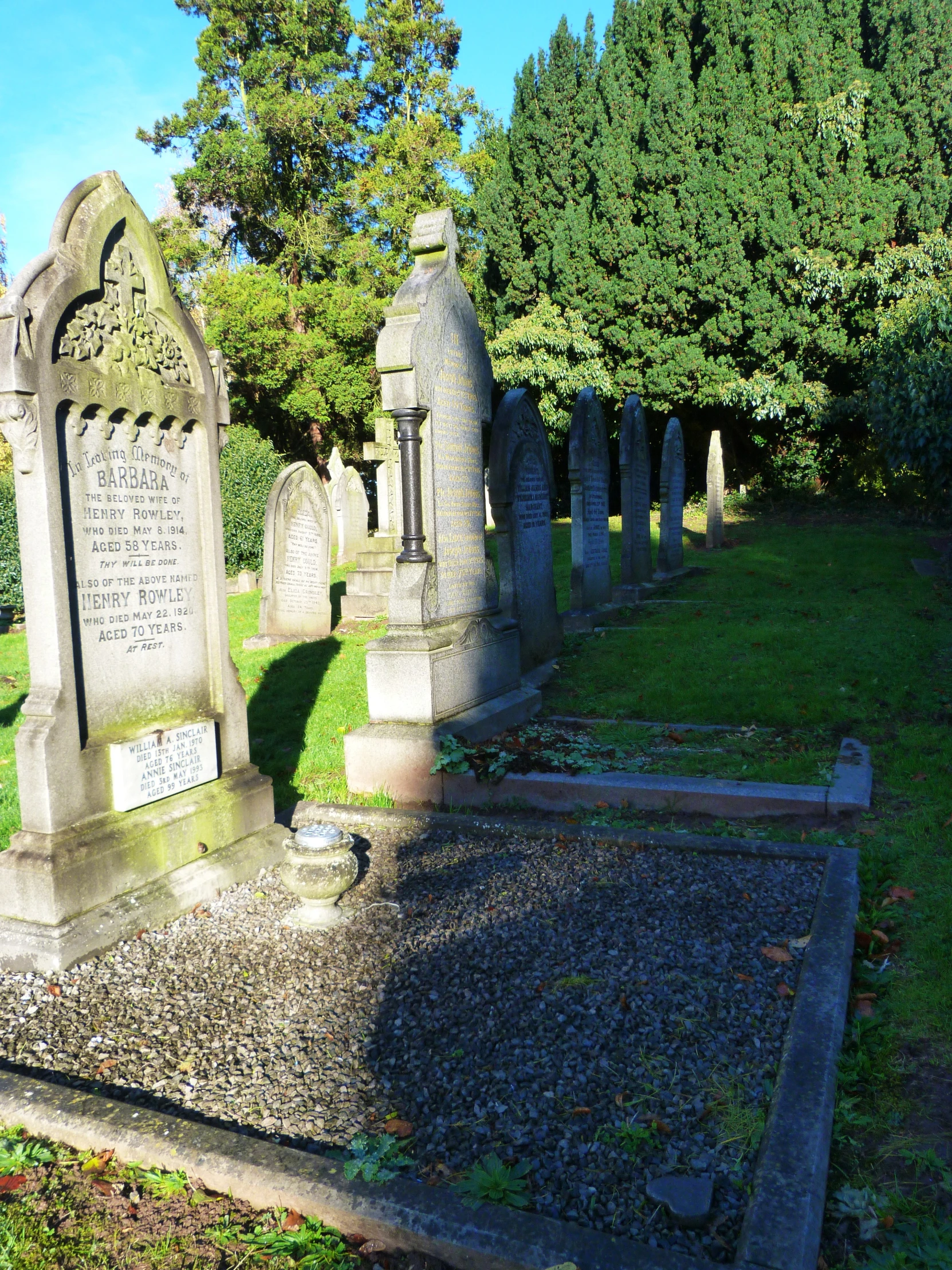 the cemetery has several headstones with names on it