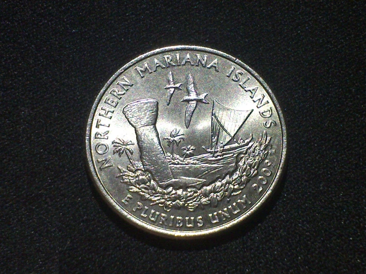 this is a canadian coin with an image of a man on it