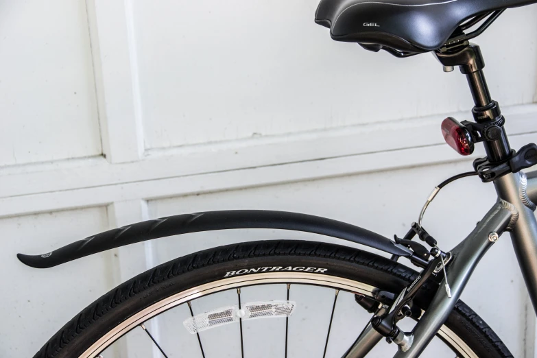 a bike locked against a garage door