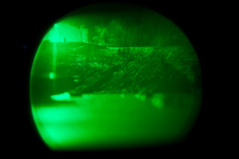 an abstract view looking down at the street in a green color