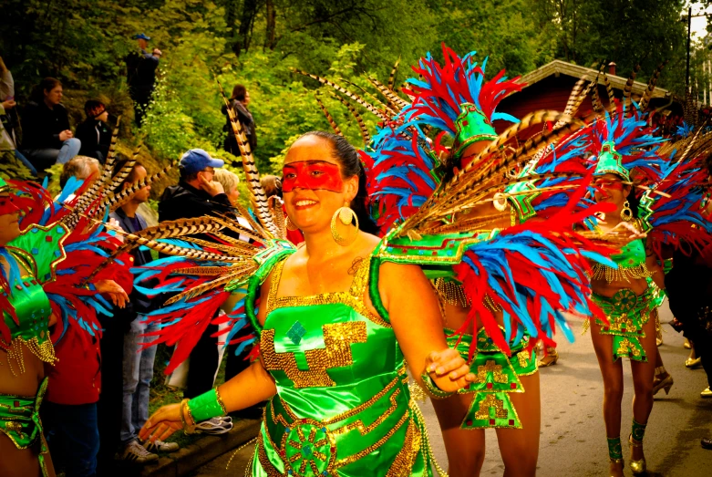 a group of woman wearing colorful costumes