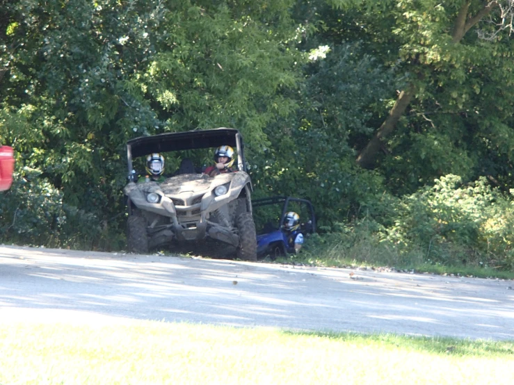 an off road vehicle has two passengers in it