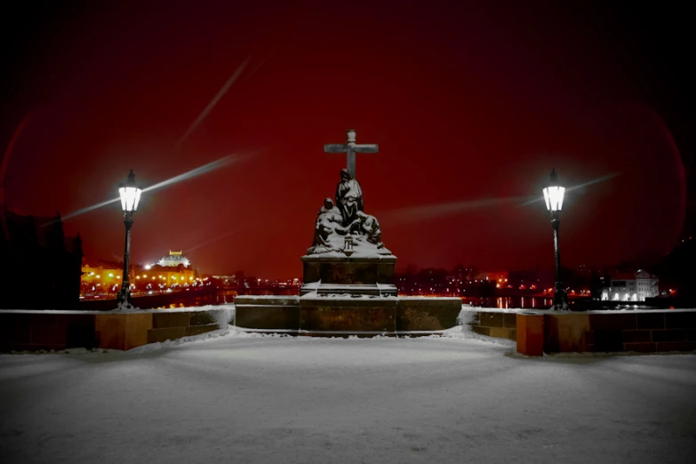 this is a snowy scene of a religious monument