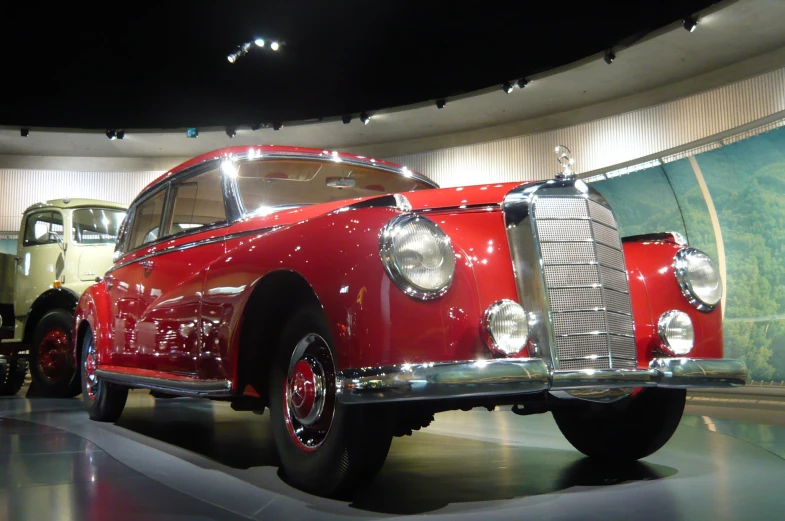 the vintage car is on display at the exhibit