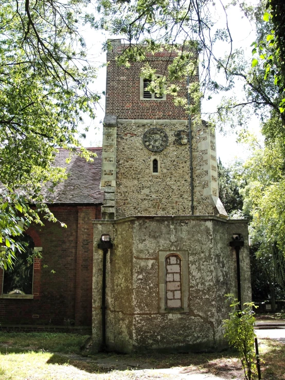 a castle type tower with a clock at the top