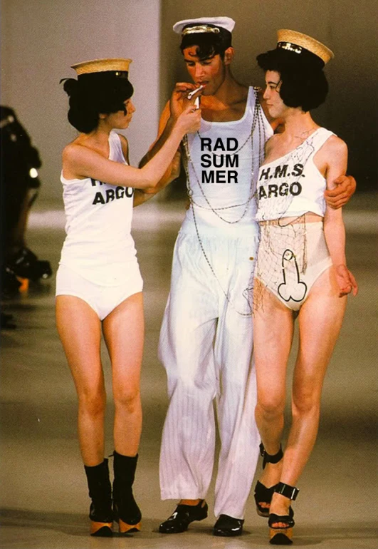 three models walking down the runway in different outfits