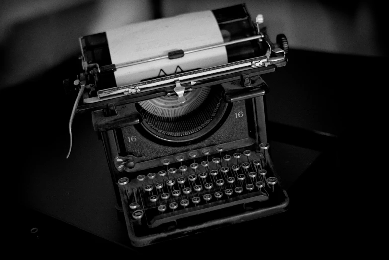 a black and white po of an old fashioned typewriter