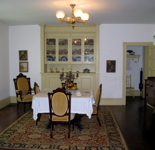 the dining room has wooden furniture in it