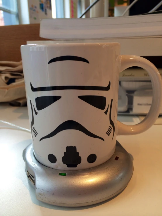 this is a coffee cup with star wars decals