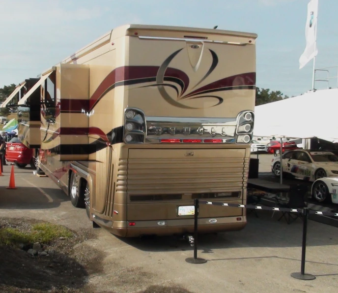 the back of an rv parked on top of a road