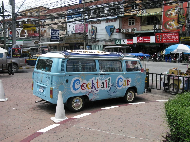 an old van painted in different colors and designs