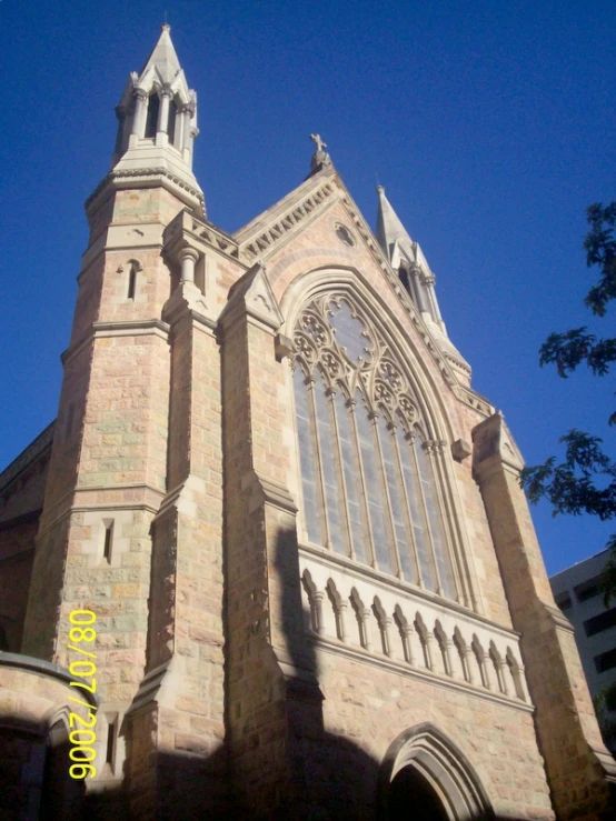 an old, historic building with a blue sky background