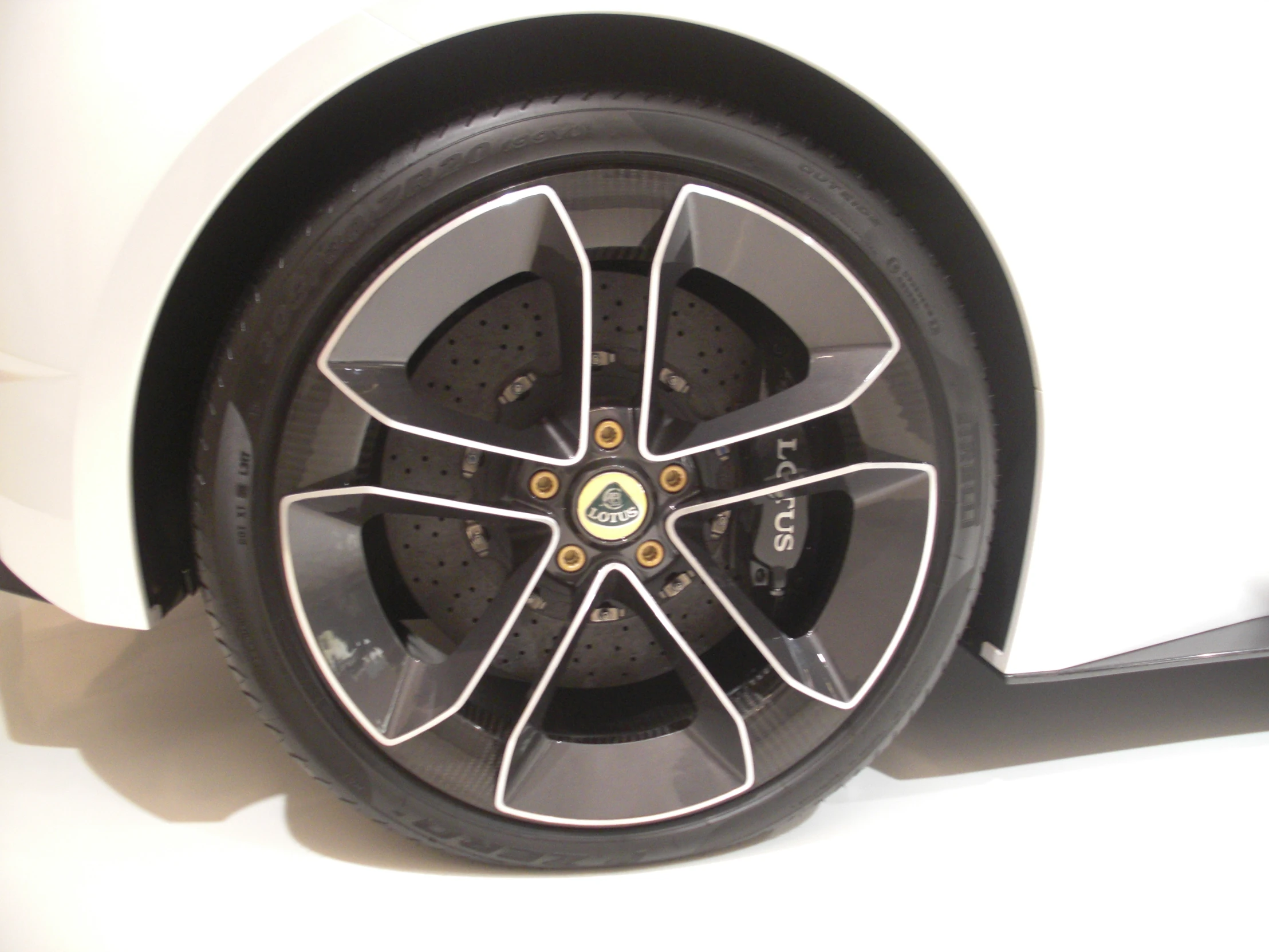 a wheel is shown on the back end of a car