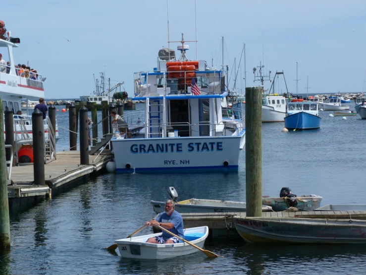 the people are in a boat with a paddle