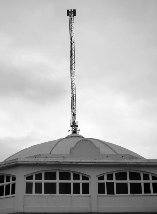 the top of a building with a large tower on it