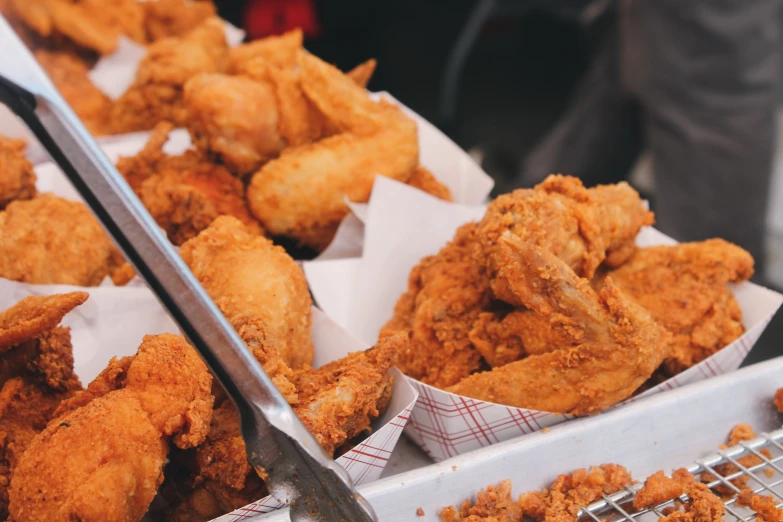 fried food items in baskets on a table