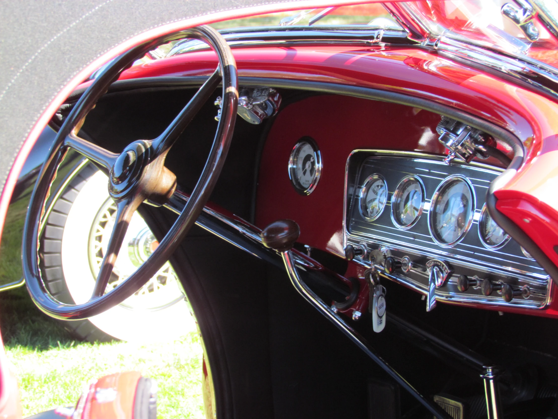 the steering wheel and dash lights on an older model car