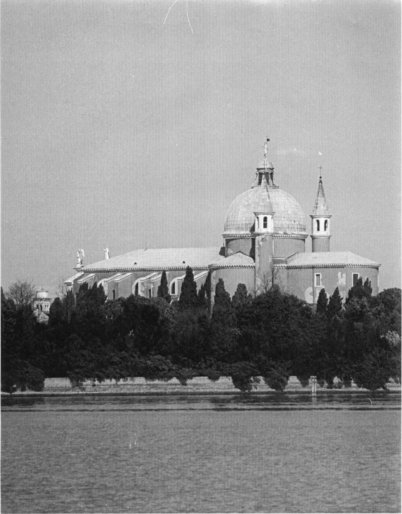 a large building in the middle of the water