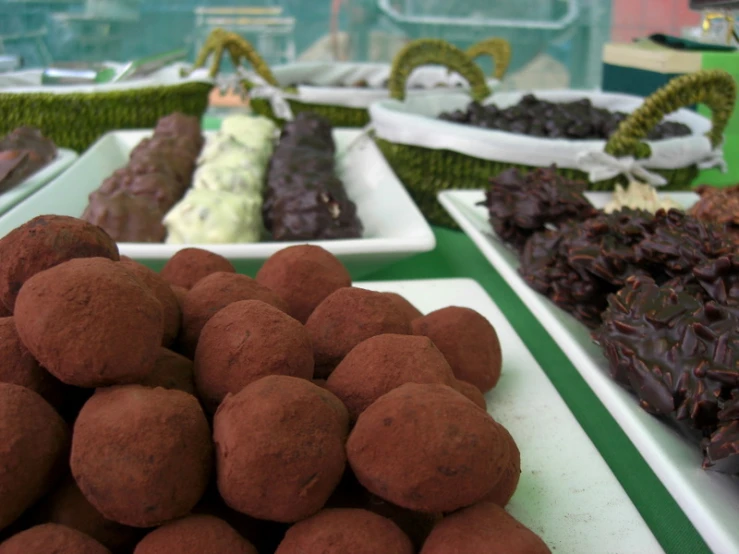 the platter of chocolate is decorated with sprinkles