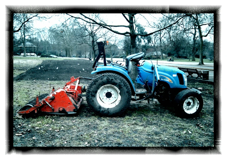 a tractor that is on top of a field