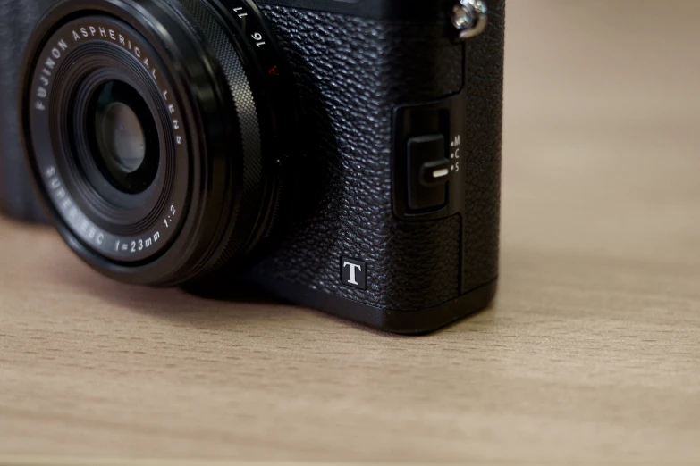 the view of a closeup of a camera with it's lens pointed upwards