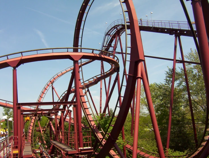 a train rides through a set of coasters