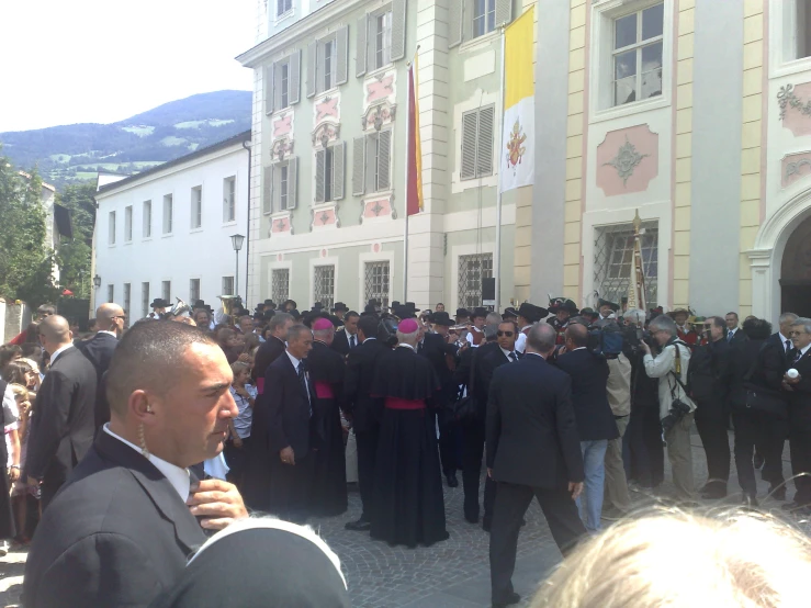 a large group of people outside a building