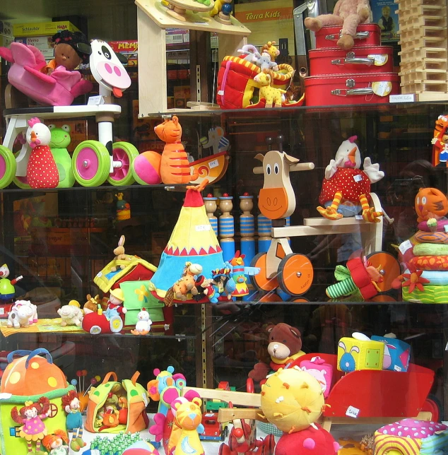 the view of a toy shop window shows different toys