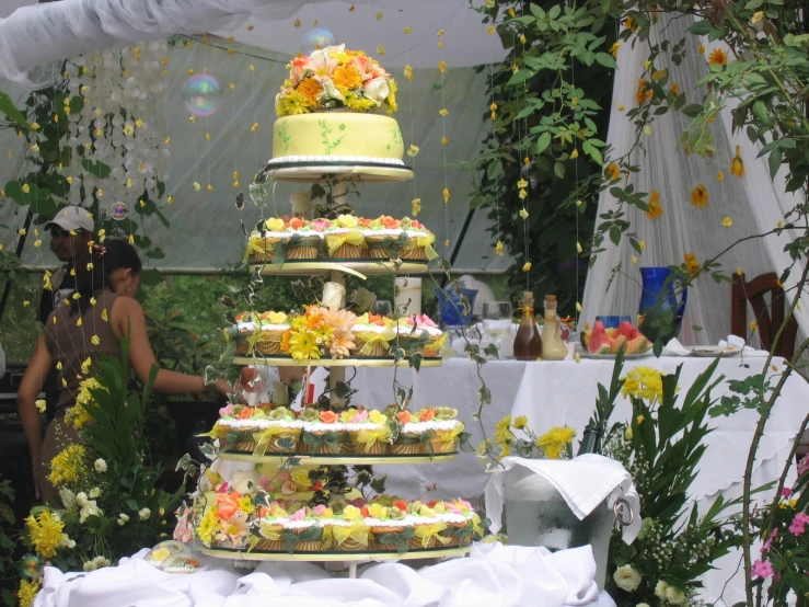 the wedding cake is decorated with flowers and icing