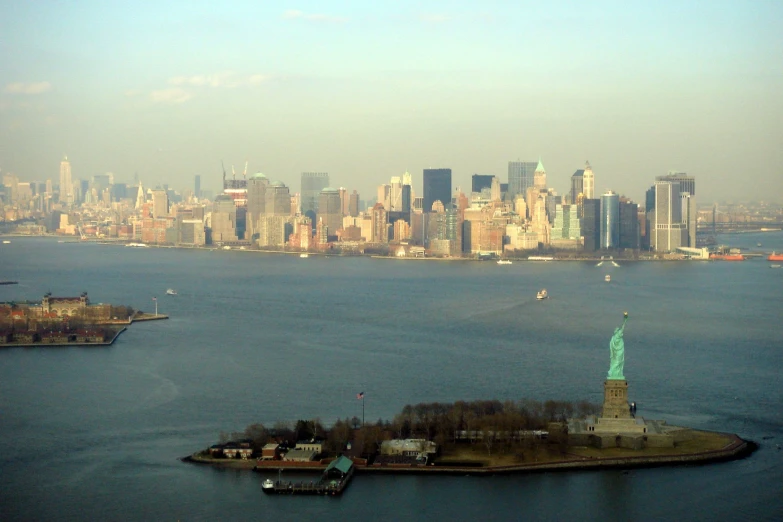 a city skyline is shown in the foreground of the water