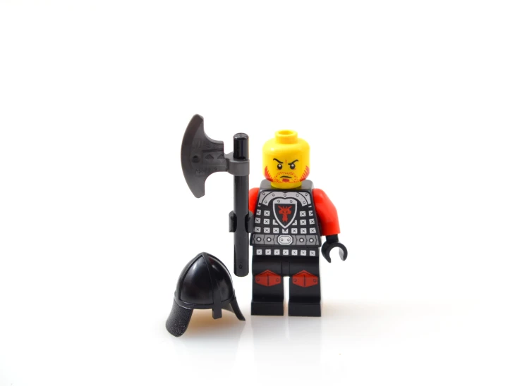 a yellow - haired lego figure holds an axe