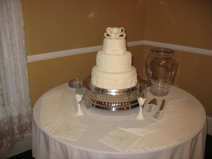 the table is covered with a large wedding cake