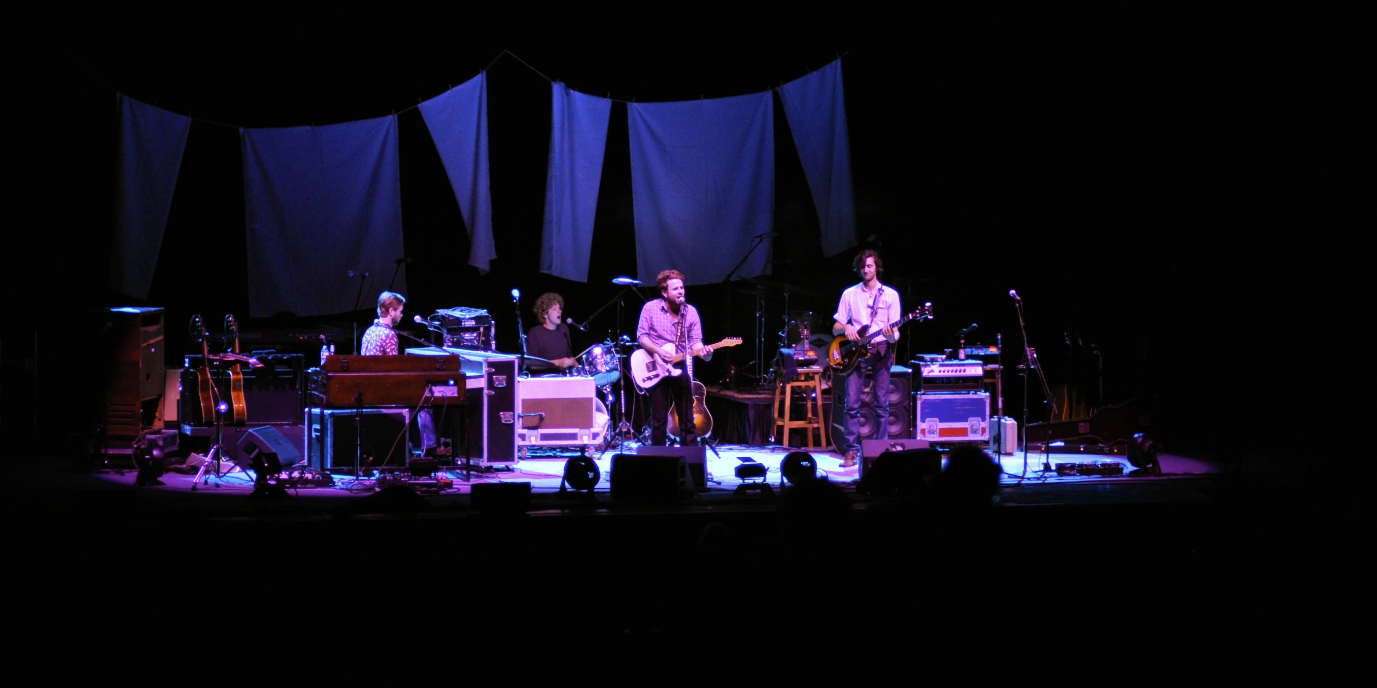 a group of people on stage performing